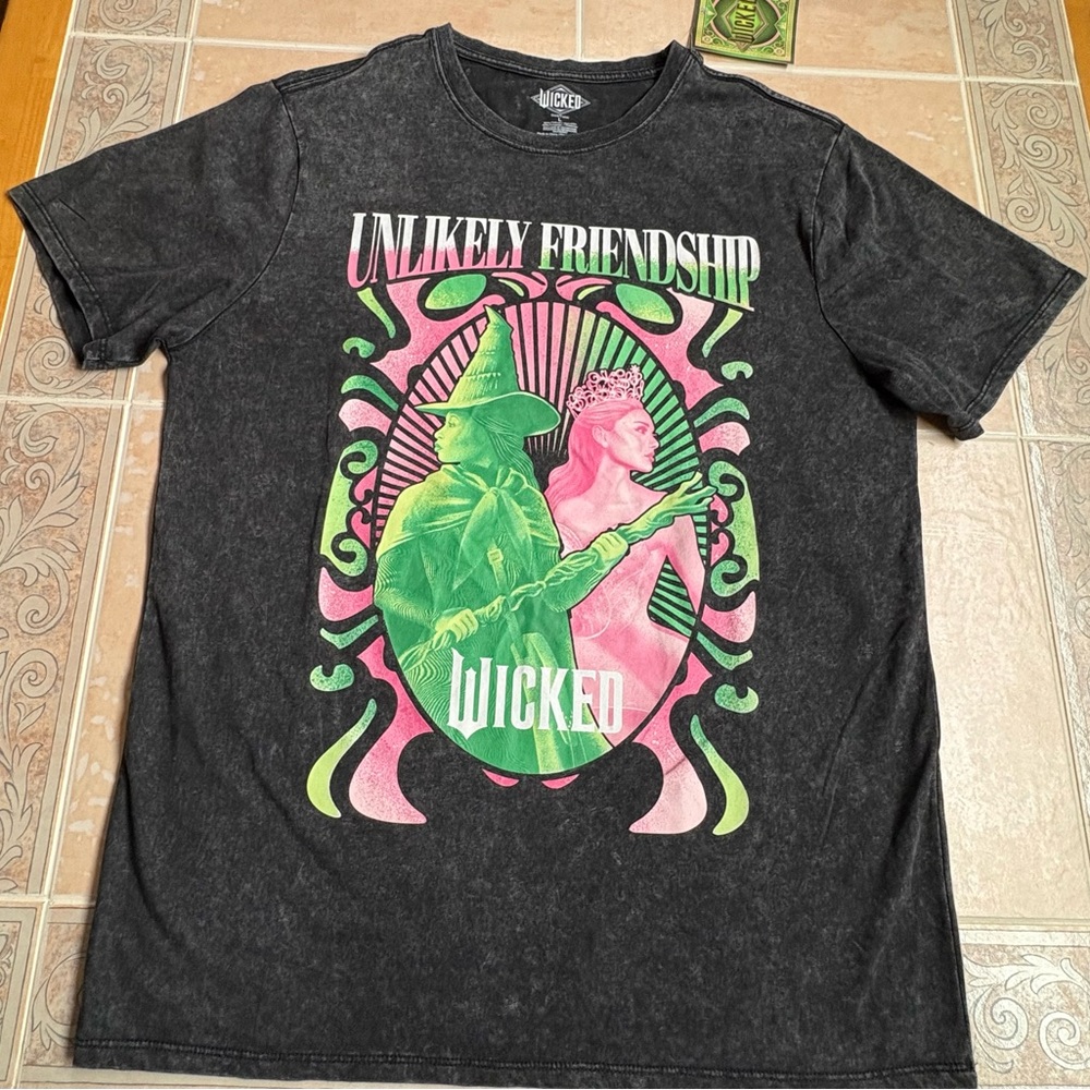 Wicked (Movie) Unlikely Friendship
Black T-Shirt NWT Unisex Large